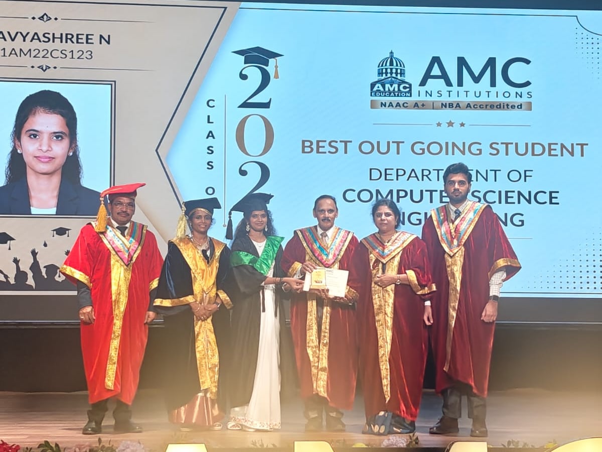 Receiving the Best Outgoing Student award on stage at AMC Institutions